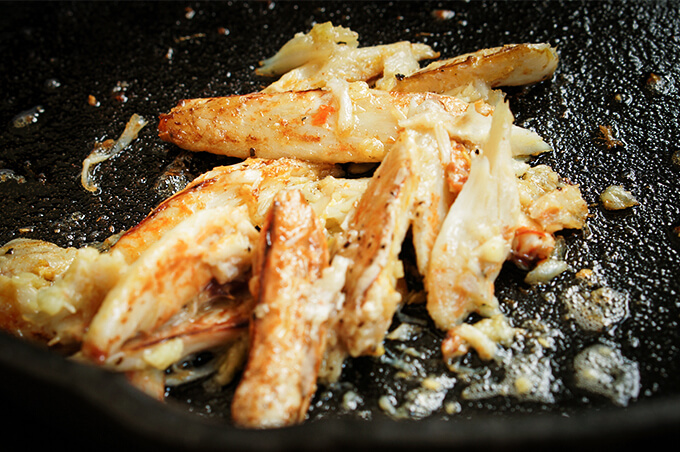 Tender crab meat is sauteed in garlic butter, and served over roasted squash and coconut puree for a luxurious appetizer. | www.viktoriastable.com