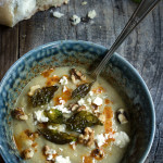 Cauliflower fennel soup - topped with crispy basil, feta cheese, toasted walnuts and paprika butter sauce. Delicious, and healthy, perfect for a cold winter day. | www.viktoriastable.com