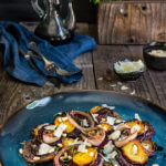 Roasted beets and charred onion salad - sweet and smoky, earthy and flavorful, with rosemary, pine nuts, Pecorino cheese, and a drizzle of truffle oil - this warm salad is nothing short of spectacular! | www.viktoriastable.com