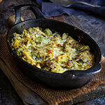 Creamy brussles sprouts and leeks - creamy, cheesy, and bursting with flavors of sweet caramelized leeks, garlic and cumin - this recipe is quick, easy and utterly delicious.| www.viktoriastable.com