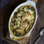 Spinach artichoke chicken casserole - this quick and easy recipe tastes like a cross between spinach artichoke dip, and chicken bake, takes 30 minutes to make, and is a great way to use leftover chicken or Thanksgiving turkey meat. | www.viktoriastable.com