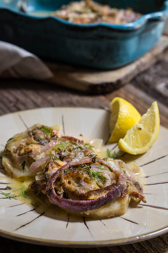 Celery root and smoked salmon gratin - in this creamy dish, aromatic celery root pairs beautifully with smoked fish, red onions and dill-flavored creme fraiche for a quick and easy dinner. | www.viktoriastable.com