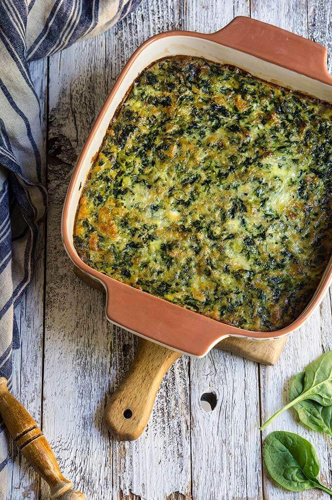 Smoky spinach rice casserole - this family favorite recipe is full of greens, yet tastes like comfort food, and will convert even picky eaters to spinach lovers. | ww.viktoriastable.com