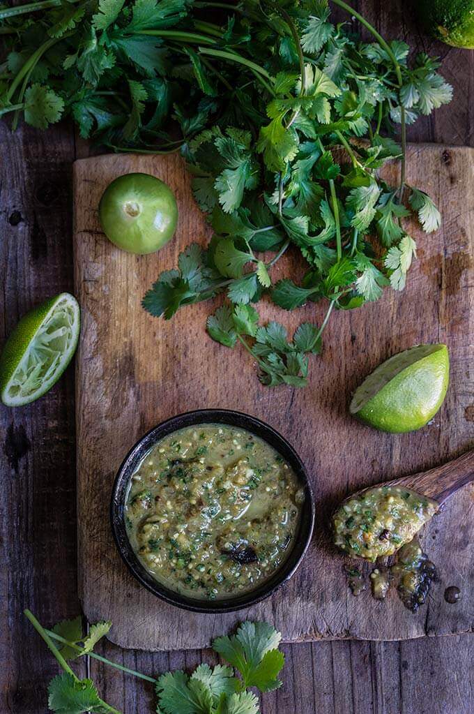 Grilled shrimp tacos with tomatillo salsa and homemade tortillas - bursting with flavor, juicy shrimp, grilled ppoblano peppers and tomatoes, topped with freshly made salsa verde, and served over soft homemade flour tortillas. | www.viktoriastable.com