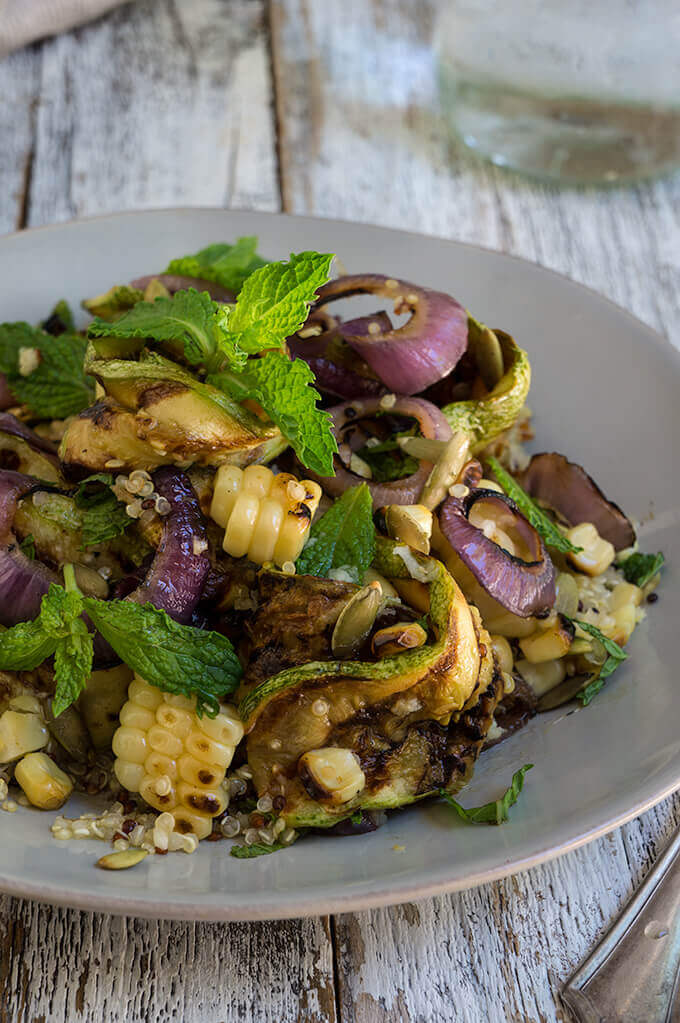 Grilled zucchini and corn quinoa salad - loaded with sweet, grilled summer veggies, healthy quinoa and crunchy toasted pepitas, and bursting with fresh, citrus and mint flavors - so bright, delicious and filling. | www.viktoriastable.com