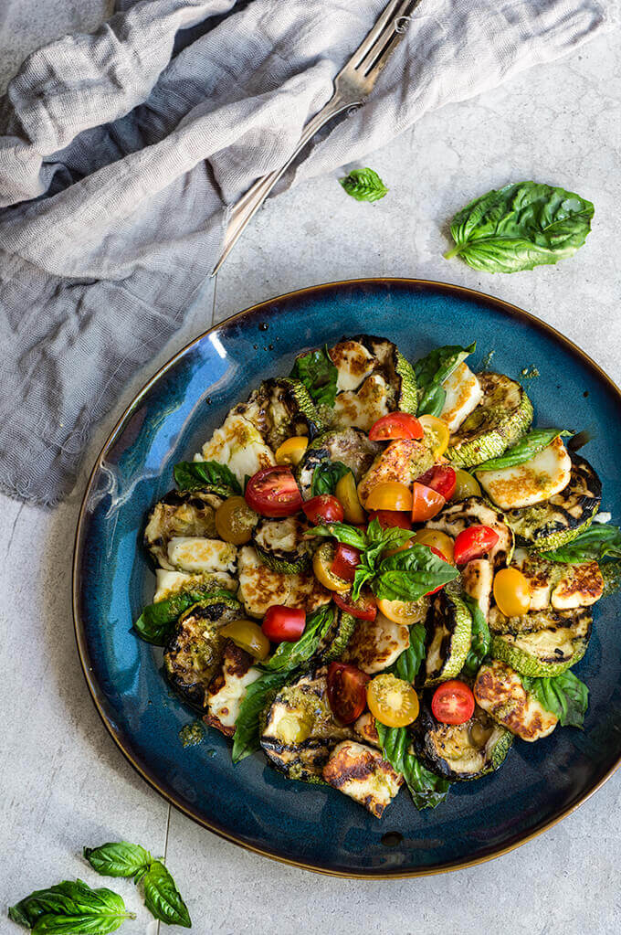 Grilled halloumi and summer squash Caprese salad - a twist on the beloved classic, made with grilled summer squash, and halloumi cheese. | www.viktoriastable.com