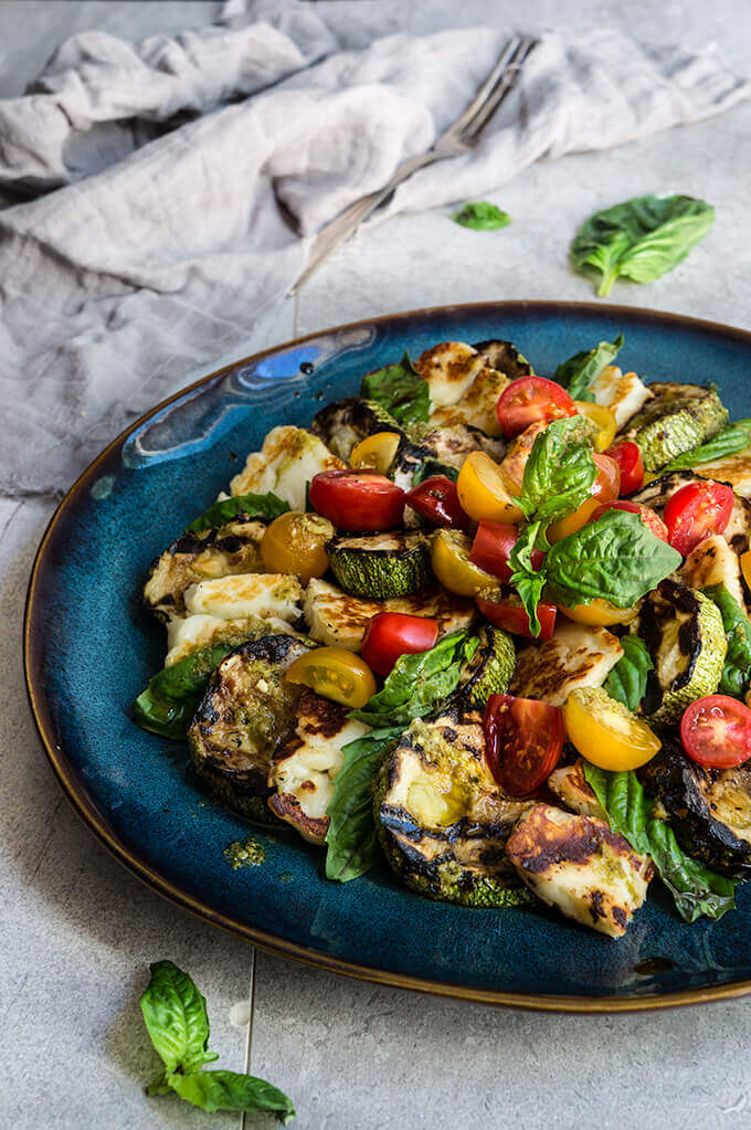 Grilled halloumi and summer squash Caprese salad - a twist on the beloved classic, made with grilled summer squash, and halloumi cheese. | www.viktoriastable.com