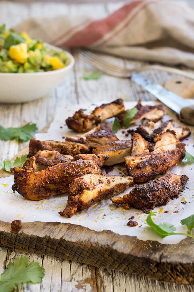 Recado rojo BBQ chicken - bright and zesty, with a robust spicy and floral aromas, this chicken recipe is particularly good for summer, served with a fruity salsa on the side. | www.viktoriastable.com