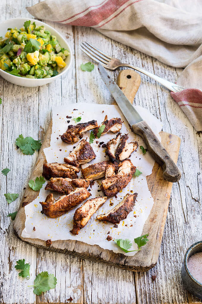 Recado rojo BBQ chicken - bright and zesty, with a robust spicy and floral aromas, this chicken recipe is particularly good for summer, served with a fruity salsa on the side. | www.viktoriastable.com