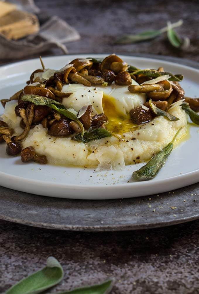 Truffled cauliflower puree with mushrooms and sage butter - creamy and delicious dish, infused with the earthly aroma of truffles and sage, and topped with an oozy egg. | www.viktoriastable.com