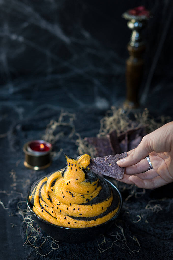 Black bean and sweet potato hummus dip - black and orange, sweet and spicy, Halloween-inspired, hummus dip. | www.viktoriastable.com