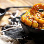 Roasted delicata squash with grilled cheese - almond-crusted delicata squash, roasted in coconut oil, garlic and cinnamon to a golden delicious sweetness, then paired with mild grilled queso panela cheese for the perfect sweet-and-savory balance of flavors. | www.viktoriastable.com