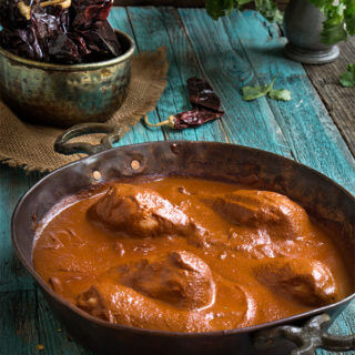 Chocolate hazelnut chicken mole - hints of dark chocolate and toasted nuts, touch of sweetness, and layer upon layer of complex flavors that blend into this sublime mole sauce, spooned over cooked chicken. | www.viktoriastable.com