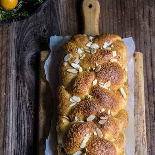 Bulgarian Easter bread - kozunak is a cotton-soft, sugar-crusted sweet bread, studded with rum-soaked raisins, and perfumed with vanilla and lemon zest - the ultimate Easter treat. | www.viktoriastable.com