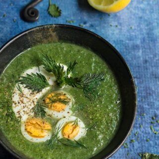 Nettle and green garlic soup - this creamy soup tastes like the spring, with flavors of mild garlic, aromatic dill, and fresh lemon, and is packed with cleansing nutrients and minerals. | www.viktoriastable.com