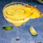 Spicy pineapple margarita - icy-cold, with a spicy kick, fruity and refreshing, served with a fragrant rim of chili lime salt, this drink will give you just the right amount of heat and freshness. | www.viktoriastable.com